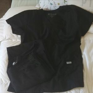 2 sets of grey’s anatomy scrubs.  Size medium slightly flair leg fit